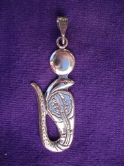 Wadjet with Disk  pendant in silver 

from Egypt